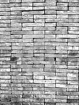 Grunge horizontal blackÃ¢â¬â¹ andÃ¢â¬â¹ whiteÃ¢â¬â¹ tone brick wall. photo